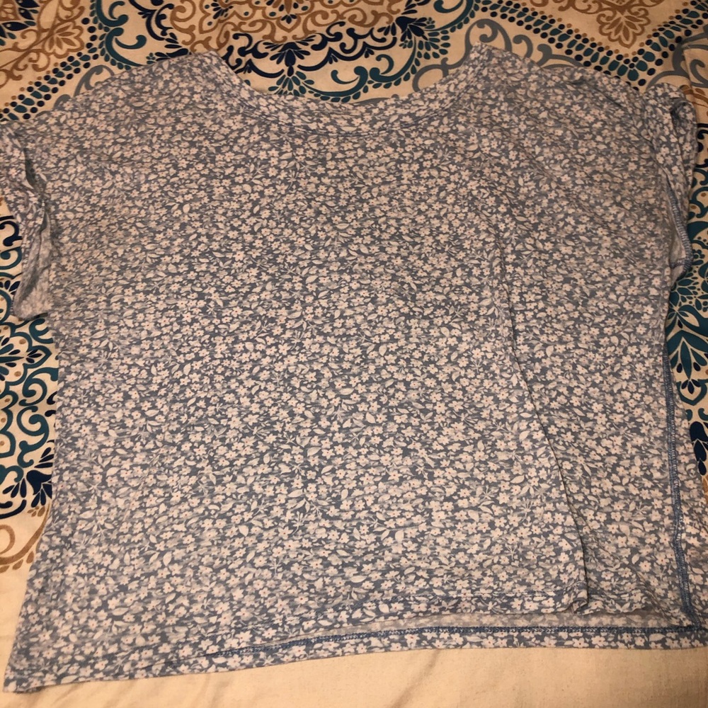 Blue tee with white flower pattern